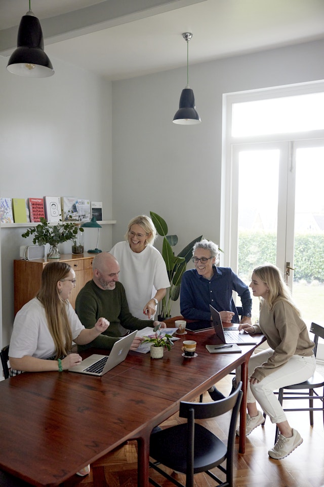 The Kind team in a meeting