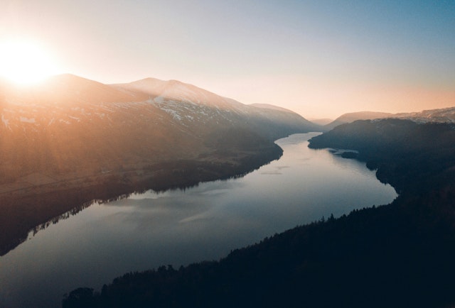 A landscape image of a river taken from a drone