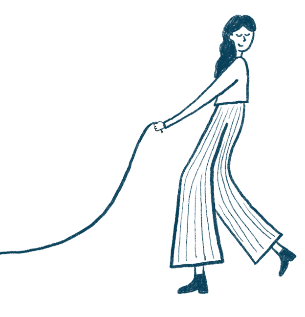 A young woman, looking behind her and taking a lead for a walk.
