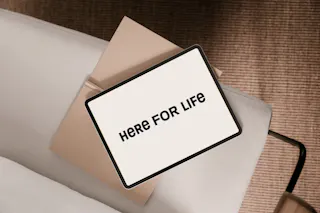 &lsquo;Here for Life&rsquo; strapline on a tablet device