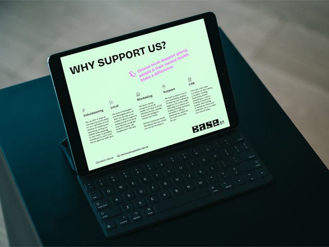 Mockup of Base 51 fundraising document on a tablet screen