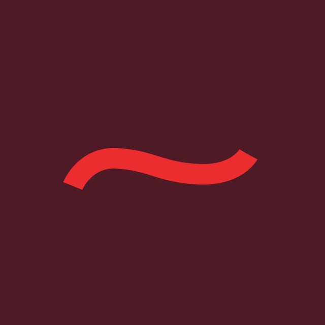 A tilde shape in red on maroon