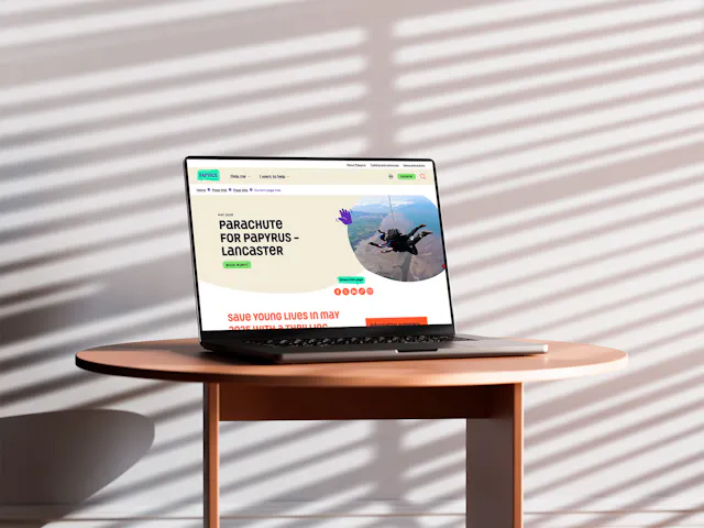 Papyrus event page on a laptop, on a table